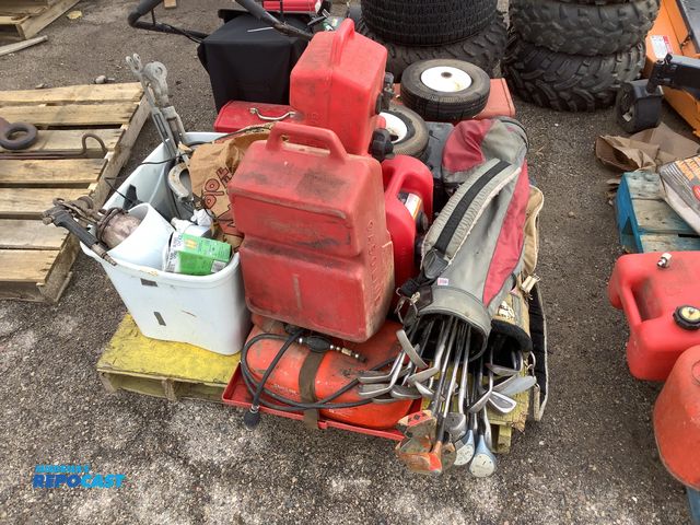 Lot 2-35873 - Skid Lot of Assorted Fuel Cans, Golf Clubs, Hand Tools, Chainsaws, Toolboxes, Small Wheels, and More