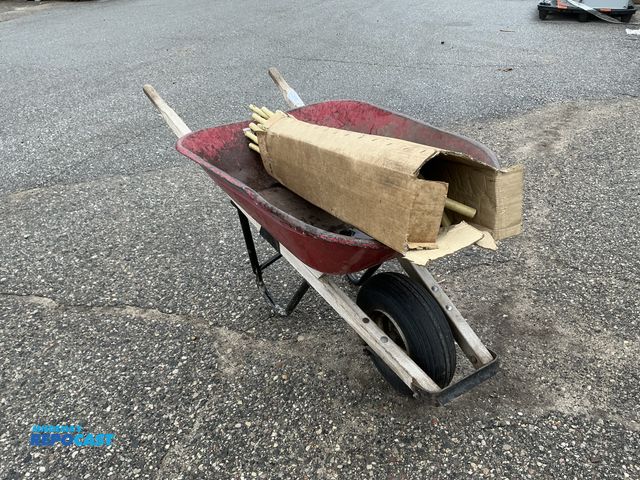 Lot 2-60979 - Lot includes: unknown make #15600 poles &amp; Craftsman rusted wheel barrow