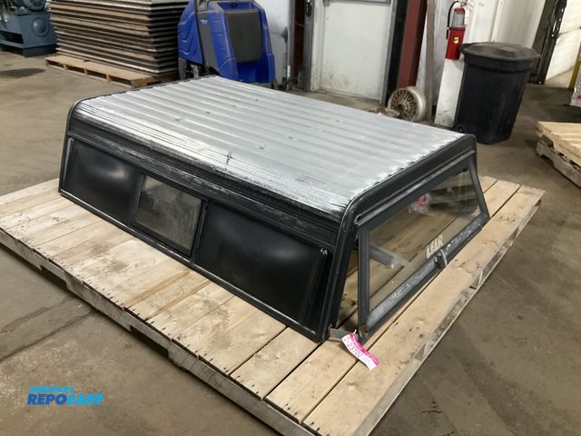 Lot 2-23700 - Leer Aluminum Topper off a 2011 Ford Ranger short bed