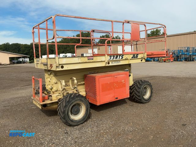 Lot 2-40774 - 1999 JLG 33RTS Rough Terrain Scissor Lift