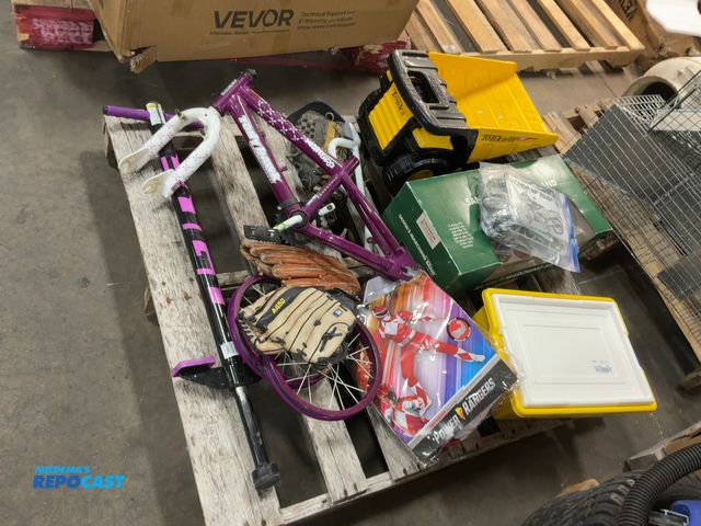 Lot 2-37044 - Skid lot of miscellaneous it’s d including baseball gloves, tonka truck dump truck, disassembled chi...