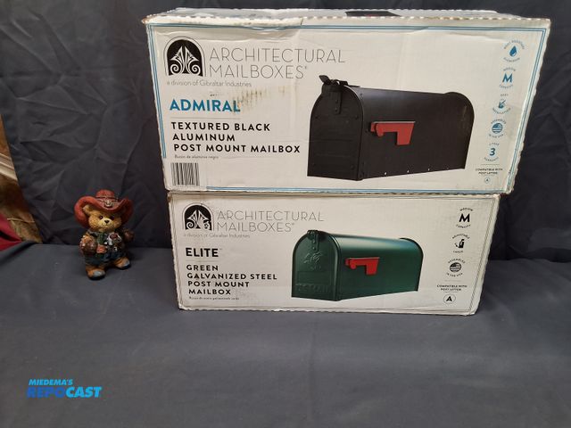 Lot 2-27555 - (1) ADMIRAL TEXTURED BLACK ALUMINUM POST MOUNT MAILBOX AND (1) ELITE GREEN GALVANIZED POST MOUNT MAI...