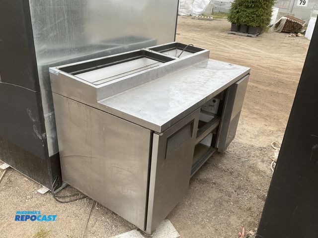Lot 2-35324 - Refrigerator with counter top for food prep.