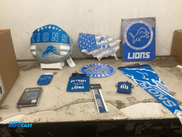 Lot 2-32993 - Lot of lions fandom gear including bags, headbands, can coolies, flag, signs, pillow and more