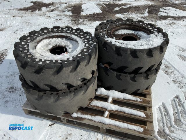 Lot 2-42834 - (4) Used Dureaco Size 30x10-16 Solid Rubber Skid Steer Tires/Wheels, 8 on 8” bolt pattern