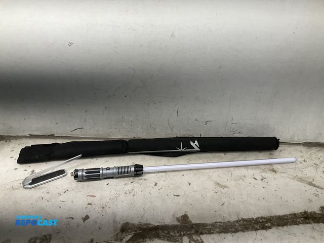 Lot 2-60413 - Collectible Star Wars Disneyworld Jedi Event lightsaber "Sith Model" (Red Light) with Real Kyber Cry...