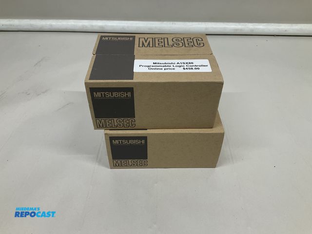 Lot 2-35554 - Lot of (2) Mitsubishi programmable controllers.