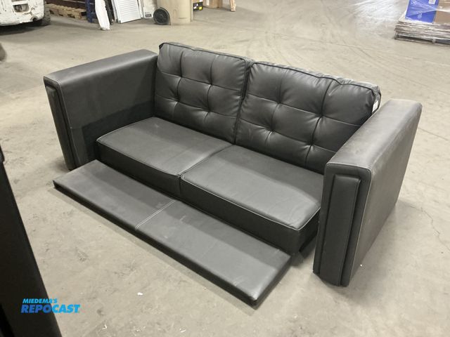 Lot 2-19864 - Dark gray sofa assembly pieces included 2 cushion couch, two side cushion pieces, floor deck  - miss...