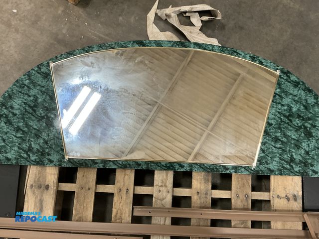 Lot 2-27156 - Skid lot of a headboard with frame and mirror