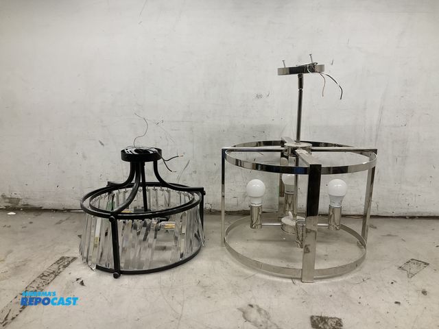 Lot 2-18593 - Lot of (2) circular chandeliers approx. 18”x22” (missing one light bulb) and 14”x12”