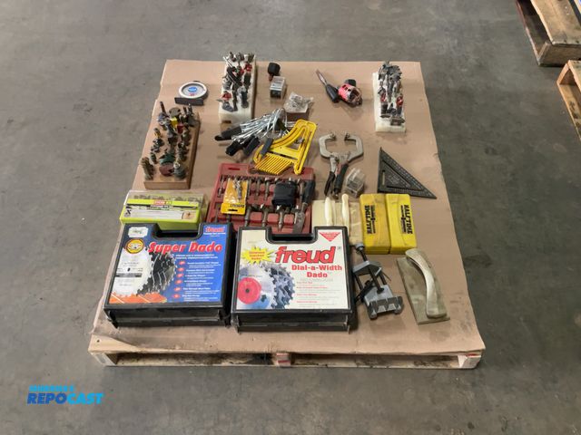 Lot 2-15525 - Skid lot of various woodworking tools including: shaper cutting bits, clamps, dado chipper blades, e...