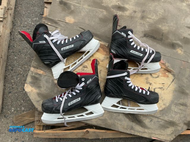 Lot 2-55611 - (2) pairs of used Bauer ice skates. Unable to tell what size. All proceeds go to Helen Devos Childre...