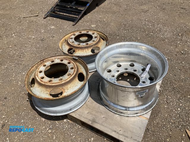 Lot 2-11158 - (1) aluminum 22.5x14.00 semi wheel and (2) steel hub piloted 22.5 semi wheels, all are used