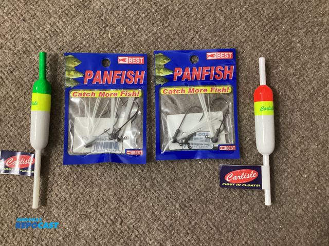 Lot 2-91258 - Two new packages of pan fish hooks. Three per package. And two Carlisle floats.
