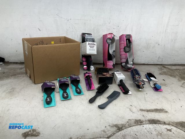 Lot 2-73458 - Lot of various hair brushes including goody slick brushes, round brushes, combs, and more