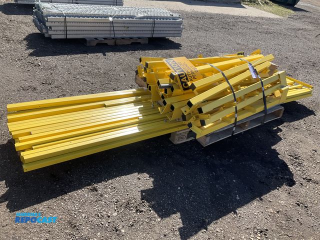 Lot 2-33122 - Steel Handrail and uprights for a mezzanine, approx (35) 1.5” x 1.5” handrails (most are 12’ long an...