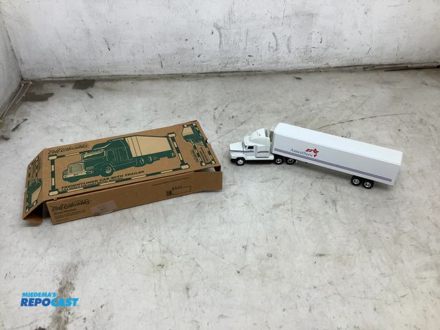 Lot 2-35150 - Ertl collectibles freightliner cab with trailer, 1/64 scale die-cast Metal replica