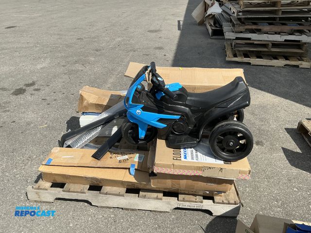 Lot 2-76301 - Miscellaneous skid lot including: roof racks, sketchers universal floor mats, kids riding motorcycle...