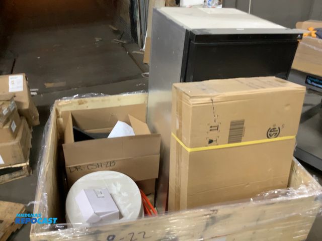 Lot 2-67817 - Crate of items including 12v refrigerator toilet a fireplace a switch shower heads and more