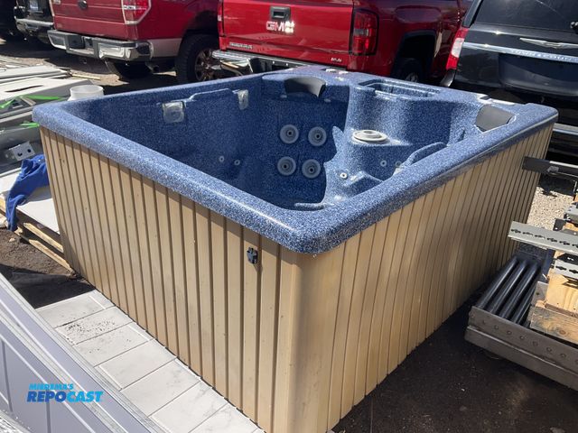 Lot 2-33350 - Large Great Lakes hot tub with waterfall and spa settings approx. 77” x 64” x 31”