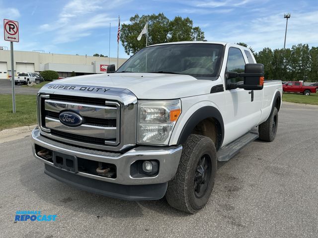 Lot 2-75206 - 2014 Ford F-250 XLT Extended Cab Long Box Super Duty Pickup Truck 4x4