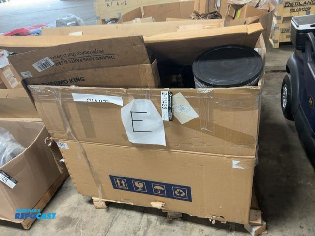 Lot 2-11428 - Skid of assorted new semi truck parts, includes install kits, tool box, air filter, brackets, fan bl...