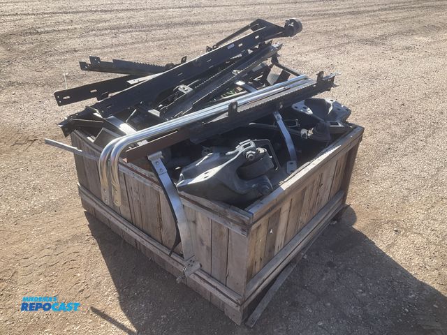 Lot 2-11749 - Crate of misc semi truck parts including side skirt frames, grab bars and suspension parts, used