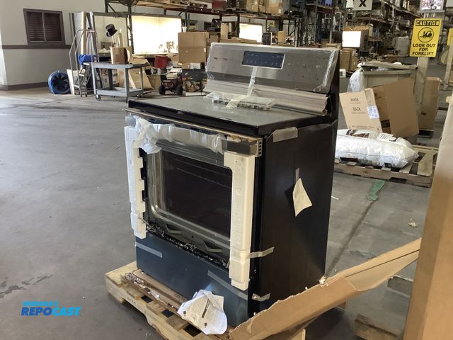 Lot 2-32726 - 4 burner electric stove approx 30” x 25” x 47” - glass door is shattered and various dents
