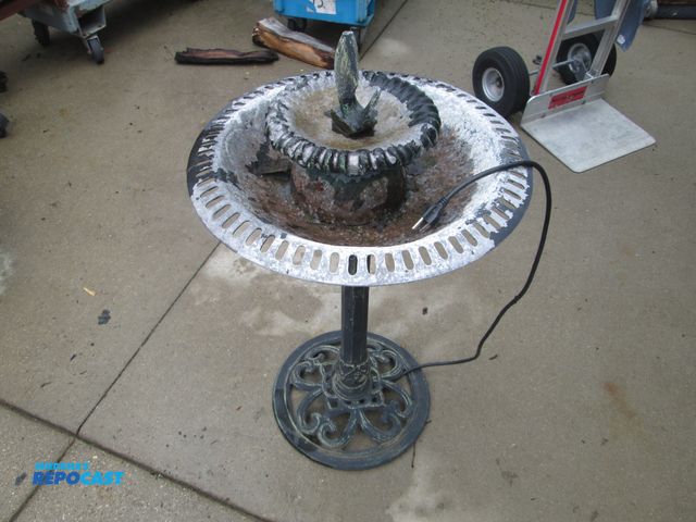Lot 2-59154 - bird bath with fish on top water pump, aluminum basin with cast iron base, 20" x 35" tall