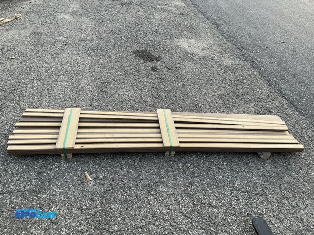 Lot 2-74053 - 24pc New adorn laminated trim - is approx. 8’ long x 2” x .75” thick