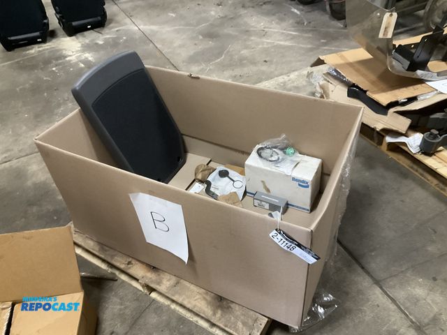 Lot 2-11148 - Lot of truck parts including 8-way plug, cabinet top, clips, studs, hinge, support, lock seal and a ...