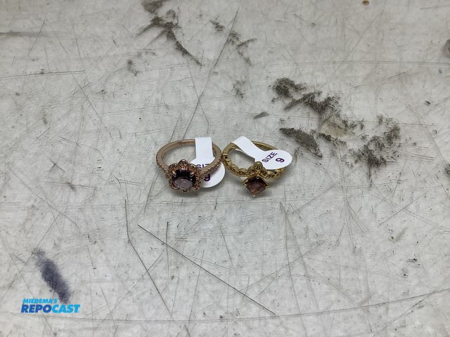 Lot 2-33859 - 2 gold lab created amethyst rings.