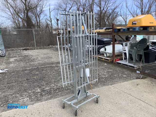 Lot 2-67013 - Metal rollable coat racking with assorted hooks