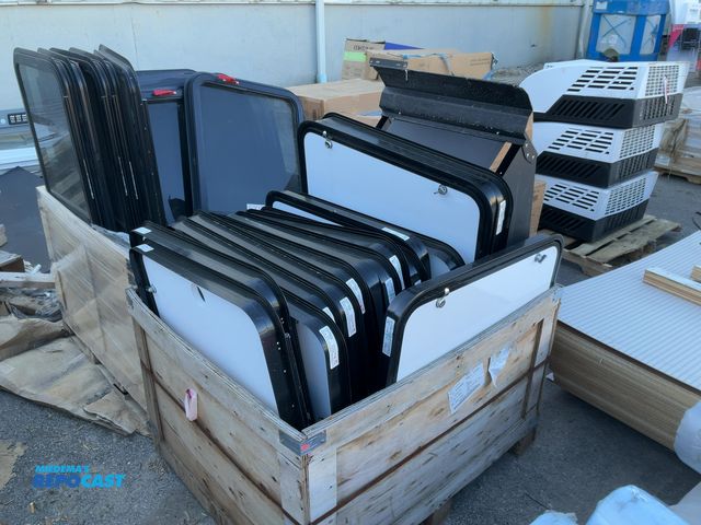 Lot 2-76391 - (1) set of RV steps and (16) Lippert cargo doors 45 28”x32”