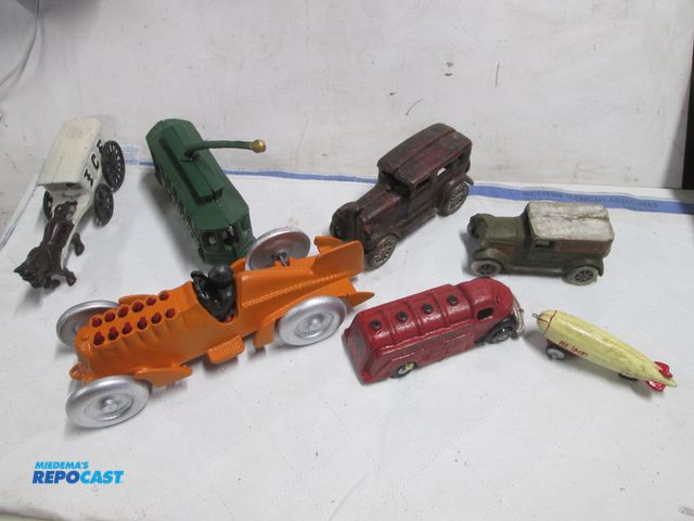 Lot 2-34675 - cast iron vehicle assortment, 8 pieces, orange hubley race car, engine moves up and down. phillips 6...