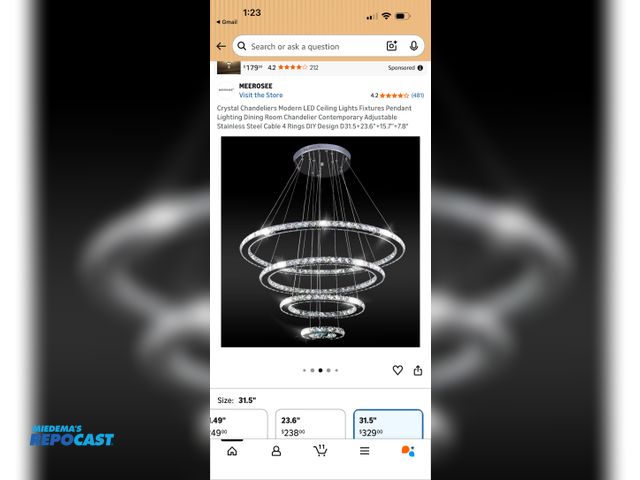 Lot 2-63163 - Meerosee crystal chandelier with a stainless steel cable.