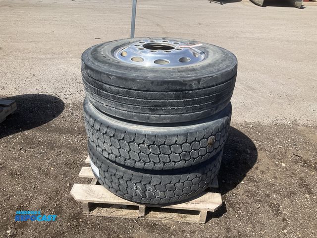 Lot 2-43667 - (3) 295/75R22.5 semi tires, one on an aluminum wheel and two on steel wheels, used