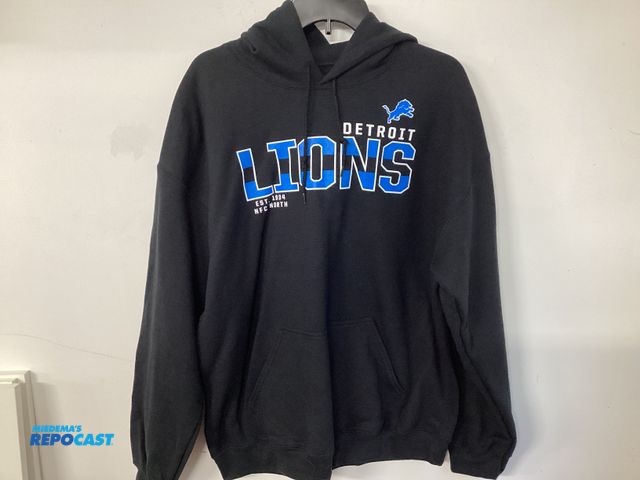 Lot 2-67332 - New Detroit Lions sweatshirt with hoodie and pouch pocket. Black. Men’s size 2XL. Official NFL team ...