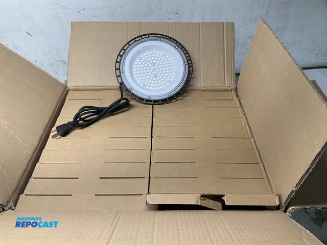 Lot 2-67045 - Lot of (20) new 100 watt, 8” LED hanging lights. Can be hard wired, but also include 5, 3-pin 115 vo...