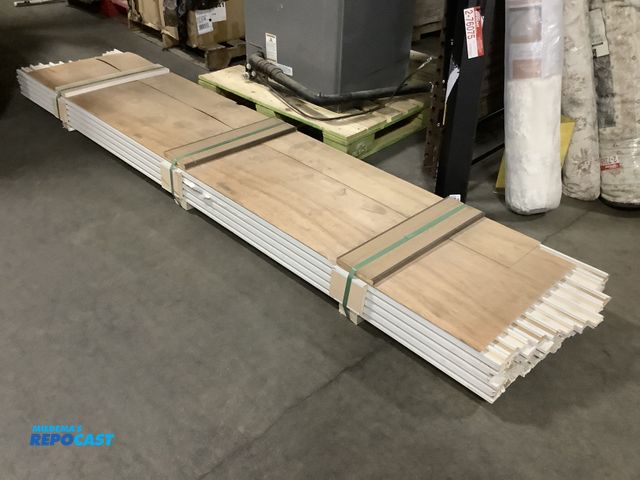 Lot 2-64232 - Skid of long white pieces of wooden Trim approx. 9’ long