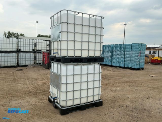 Lot 2-79851 - Stack of IBC totes - totes are approx. 46” tall x 44” x 3’