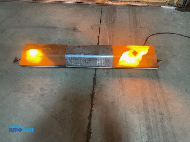 Lot 2-72706 - Used Code 3 light bar, works but may need new bulbs, minor cracks in plastic