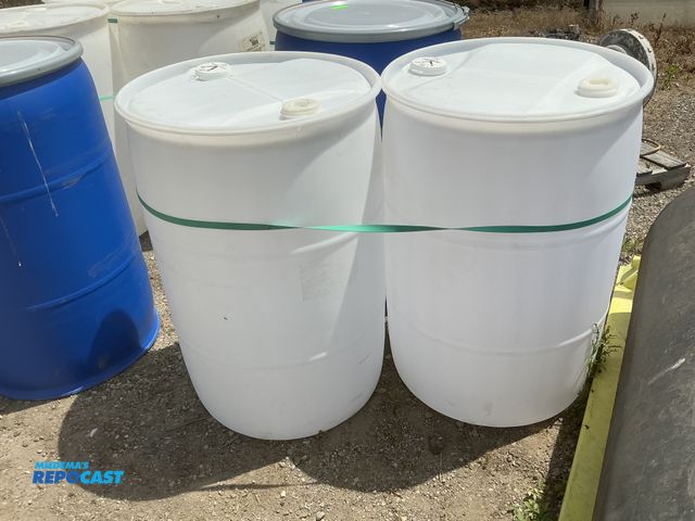 Lot 2-64040 - lot of 2 55 gallon white plastic barrels with 2 removable bungs, contained vinegar