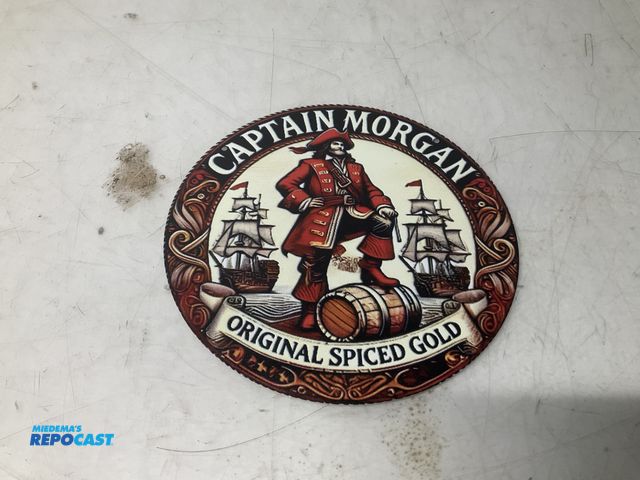 Lot 2-93887 - 8” captain Morgan circular metal sign