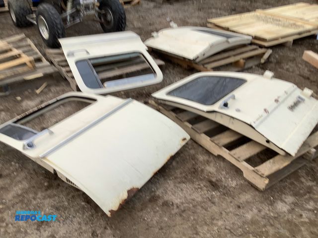 Lot 2-92375 - 4 4 cream Chevy suburban car doors rusted and dented