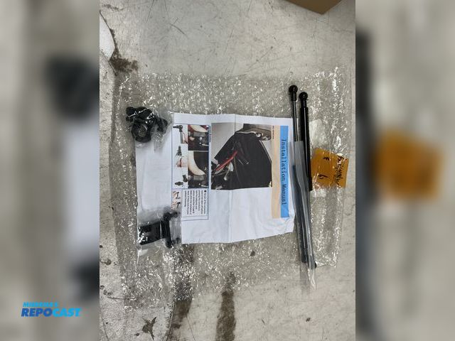 Lot 2-94715 - Two new gas struts with mounting brackets