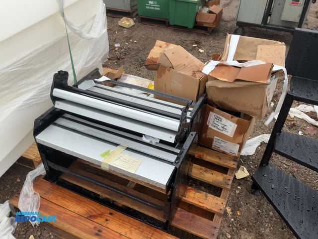 Lot 2-93701 - Skid of 2 RV Fold-out steps, 2.362” Dual Grommets, and Miscellaneous Braces