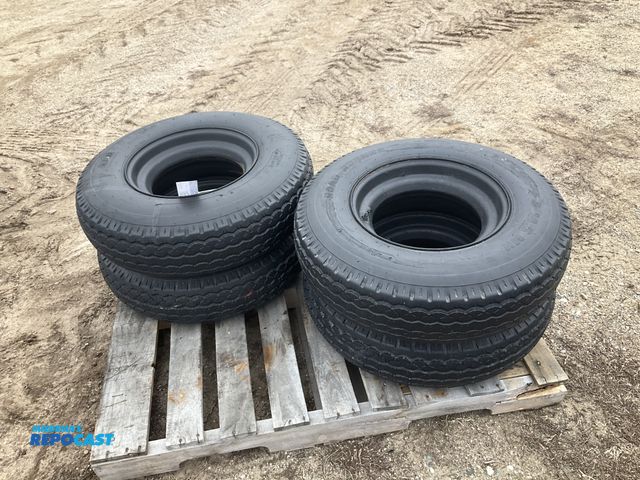 Lot 2-11561 - (4) 8-14.5 tires on steel mobile home style wheels, used
