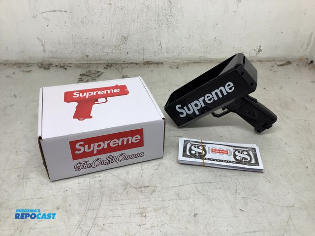 Lot 2-74004 - New Supreme cash cannon (with fake cash), black