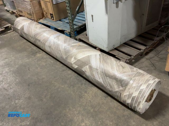 Lot 2-19093 - Gray and brown and white tile floor wood design on a roll approximately 99” long size unknown